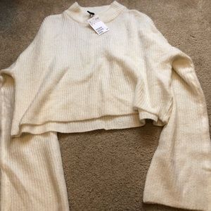 Cropped white sweater